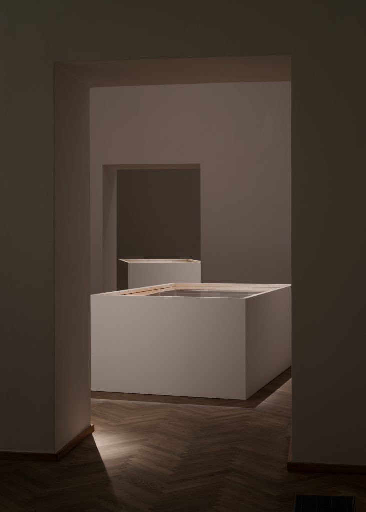 Two display cases placed in an exhibition space.