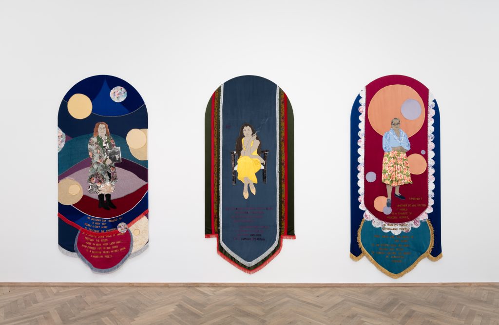 Three textile portraits.